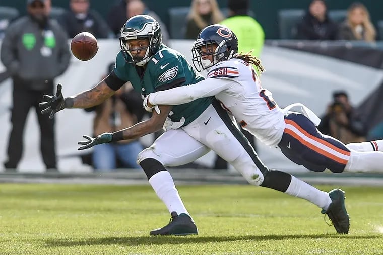 Eagles wide receiver Alshon Jeffery tries to make a catch despite BearsÕ cornerback CreÕVon LeBlanc holding his arm during the Eagles 31-3 win November 26, 2017 at Lincoln Financial Field. Jeffery couldnÕt pull the ball in and there was no penalty called on LeBlanc. CLEM MURRAY / Staff Photographer