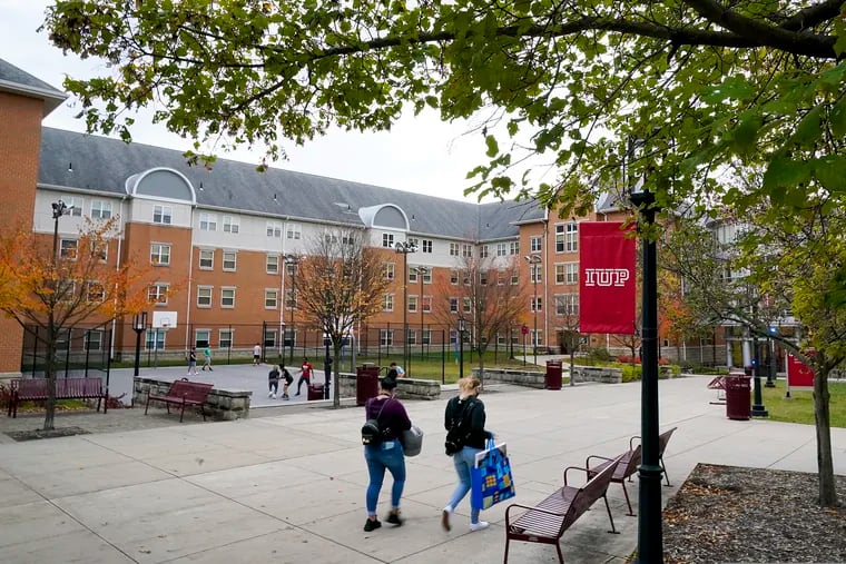 Students walk on the campus of Indiana University of Pennsylvania in Indiana.