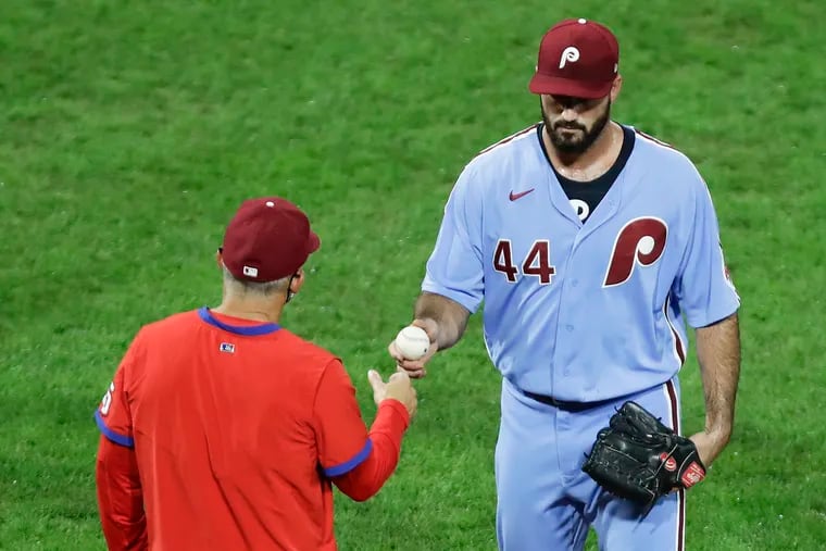 Phillies relief pitcher Brandon Workman gets replaced by manager Joe Girardi after giving up a ninth-inning RBI triple to the Mets Dominic Smith on Thursday.