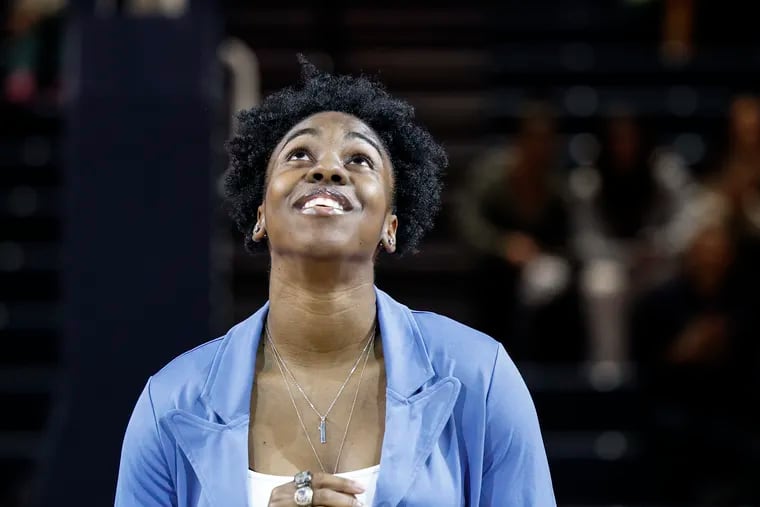 Former Drexel guard Keishana Washington has joined the Dragons as motivation and inspiration as they tip off their CAA Tournament run this week.