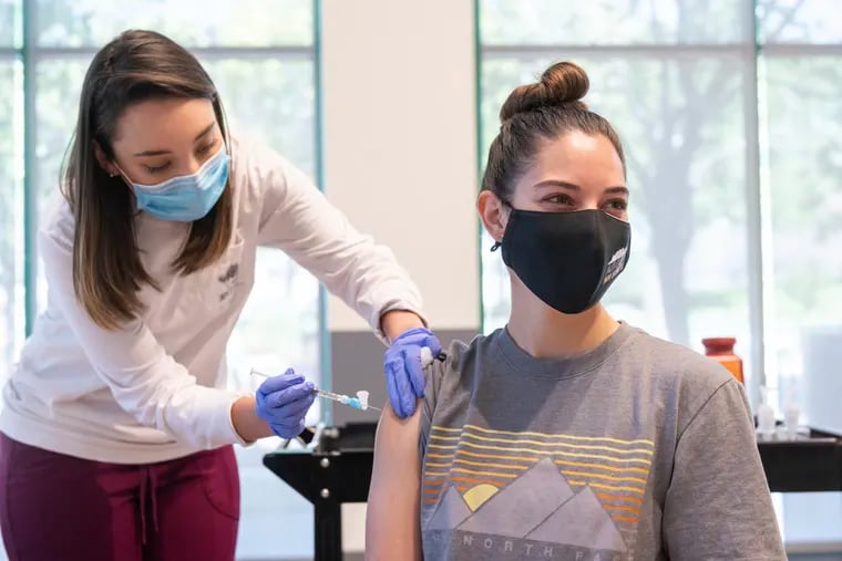 Nurse Marissa Archuleta, administering a Johnson and Johnson COVID-19 Vaccine to Lauren Naranjo at a walk in clinic at Corbett Center in Las Cruces, N.M.