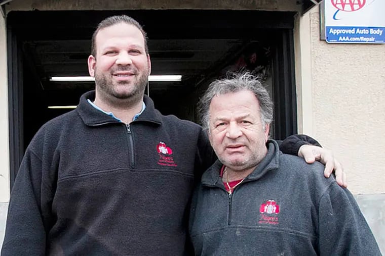 Domenico Nigro and his father, Aniello, outside their Washington Avenue auto-body repair shop. Aniello’s retired, but still checks in on the shop daily to ensure things are being done to his standards. (Alejandro A. Alvarez/Staff)