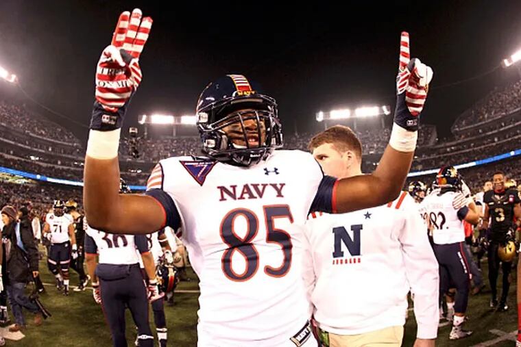 Navy Midshipmen linebacker D.J. Palmore (85) celebrates after beating the Army Black Knights 17-10 at M&T Bank Stadium. (Danny Wild/USA TODAY Sports)