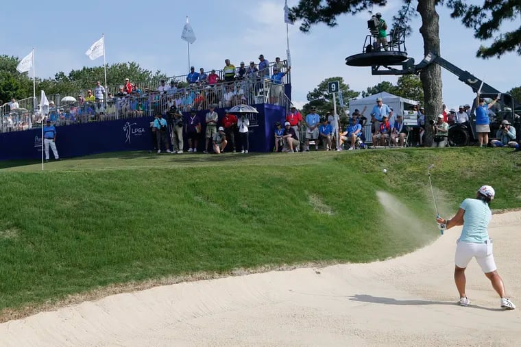 Nasa Hataoka, of Japan, hits out of the bunker on the ninth hole during the final round of the Pure Silk Championship golf tournament at Kingsmill Resort, in Williamsburg, Va., Sunday, May 26, 2019.