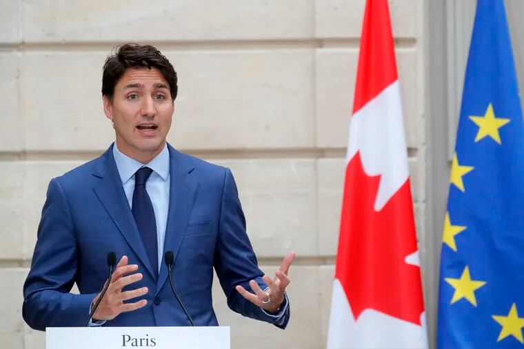 Canadian Prime Minister Justin Trudeau speaks during a joint press conference with French President Emmanuel Macron at the Elysee Palace in Paris, France, Friday, June 7, 2019.