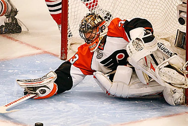 Brian Boucher makes a save in the 3rd period. (David Maialetti / Staff Photographer)