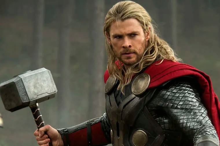 This publicity photo released by Walt Disney Studios and Marvel shows Chris Hemsworth in a scene from "Thor: The Dark World." The movie releases in the US on Friday, Nov. 8. 2013. (AP Photo/Walt Disney Studios/Marvel, Jay Maidment)