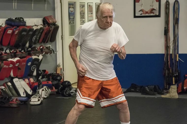 Vernon Linder, 86, warms up for his sparring match at Daddis Fight Camp on Thursday, June 2, 2016.