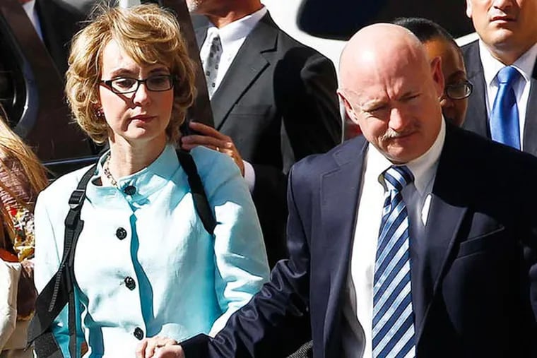 Former U.S. Rep. Gabrielle Giffords and husband Mark Kelly launched a political-action committee to push for sensible gun laws. ASSOCIATED PRESS