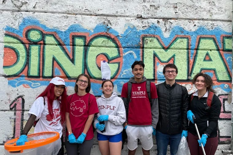 Aliya Poblete (far left) is joined by fellow Temple students at the Earth Day Trash Pickup 5K.