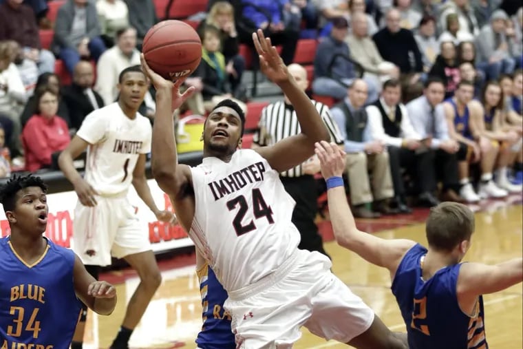 Imhotep Charter’s Donta Scott (24) was voted the Class 4A player of the year by Pennsylvania sportswriters.