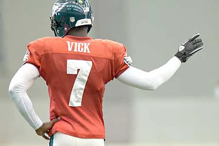 "I think there's a 100 percent chance I'll be be out there on the field this week," Michael Vick said . (Clem Murray/Staff Photographer)