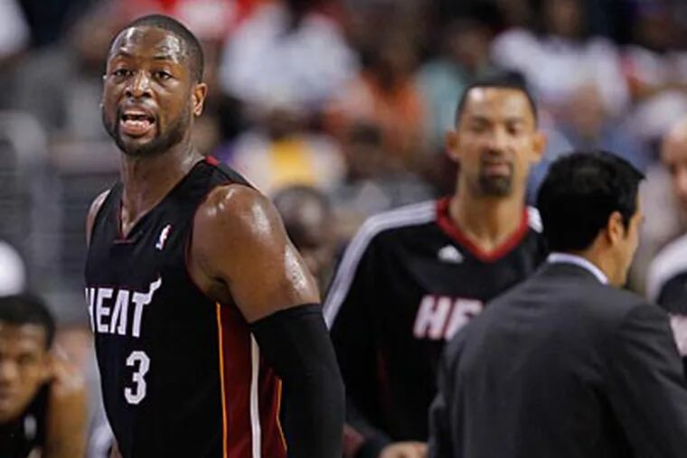 Dwyane Wade and the Heat eliminated the Sixers from the playoffs in five games. (Ron Cortes/Staff Photographer)