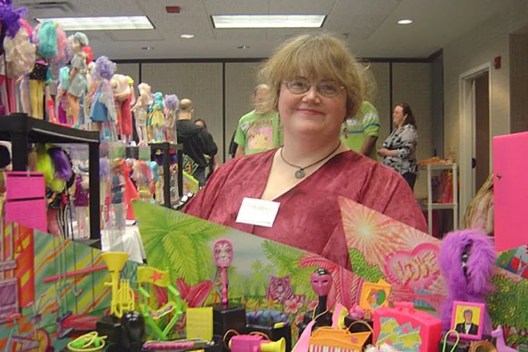 Liz Pemberton is the organizer of the 2015 JemCon, the original Jem & The Holograms fan convention, taking place at the Holiday Inn Lansdale, Aug. 28-30, 2015.