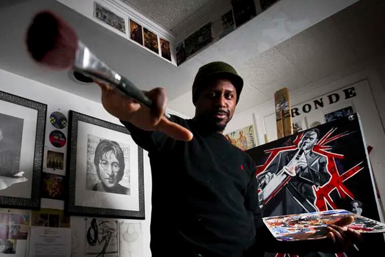 Philadelphia artist Oronde Kairi of Philadelphia at his basement studio in his home on Gilbert St., in the Mt. Airy section of the city. Photograph from Wednesday, January 8, 2014. ( ALEJANDRO A. ALVAREZ / STAFF PHOTOGRAPHER )