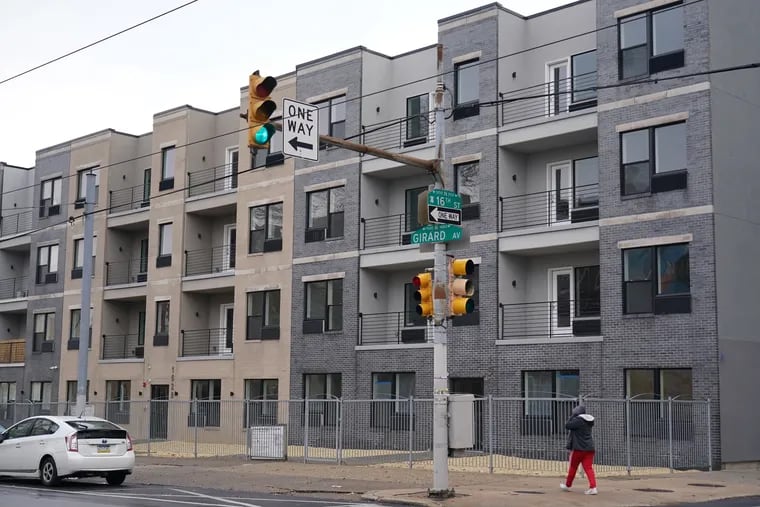 This three-building apartment complex at 1522-34 W. Girard Ave. has remained mostly empty due to issues with its water-grid connection.