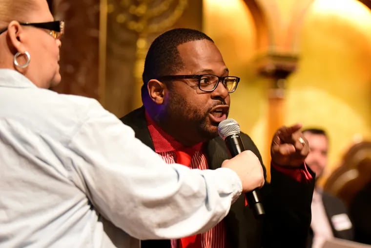 Willie Singletary, Democratic candidate for Philadelphia City Council At-large, speaks at a forum hosted by the Alliance for a Just Philadelphia at Congregation Rodeph Shalom Sunday. Moderator Lorraine Haw holds the microphone.