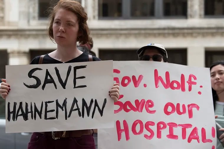 Patients, hospital staff, medical students and a variety of community groups rally outside Hahnemann Hospital on Sunday, July 14, 2019 in Philadelphia, PA.