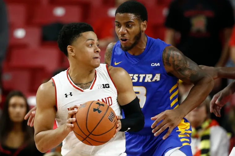 Hofstra guard Justin Wright-Foreman, right, defending Maryland guard Anthony Cowan Jr. during a November game.