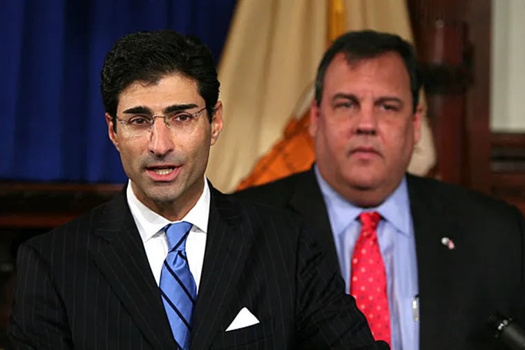 Marc Ferzan (left) is stepping down as head of Gov. Christie's Sandy recovery effort. (N.J. Governor's Office/File)