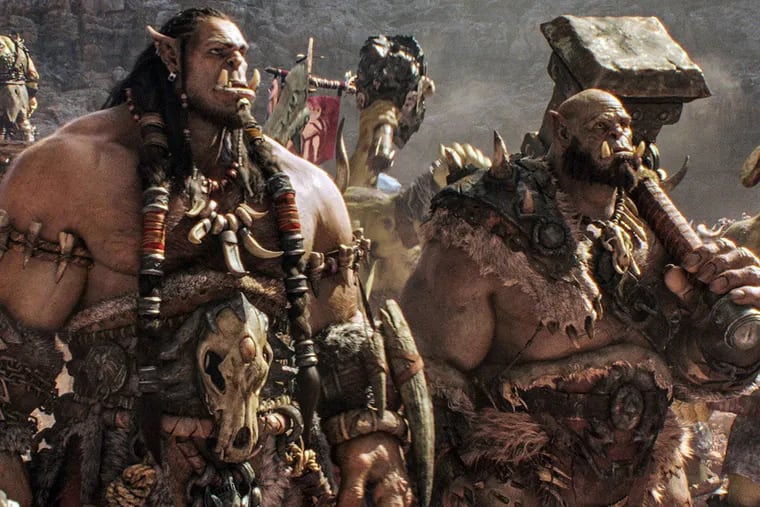 Game of orcs: Durotan (Toby Kebbell, left) and Orgrim (Rob Kazinsky) ponder their next move in "Warcraft: The Beginning."