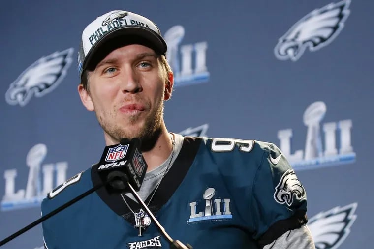 Eagles quarterback Nick Foles smiles answering questions during the Eagles media availability on Wednesday. Foles’ bobblehead price has increased by 900%.