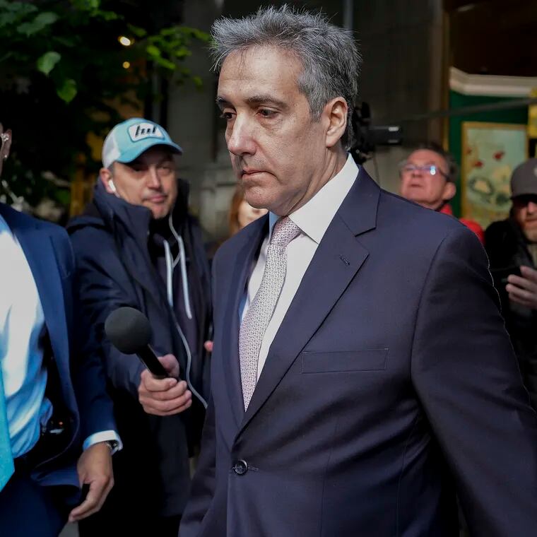 Michael Cohen leaves his apartment building on his way to Manhattan criminal court on Monday, May 13, 2024.