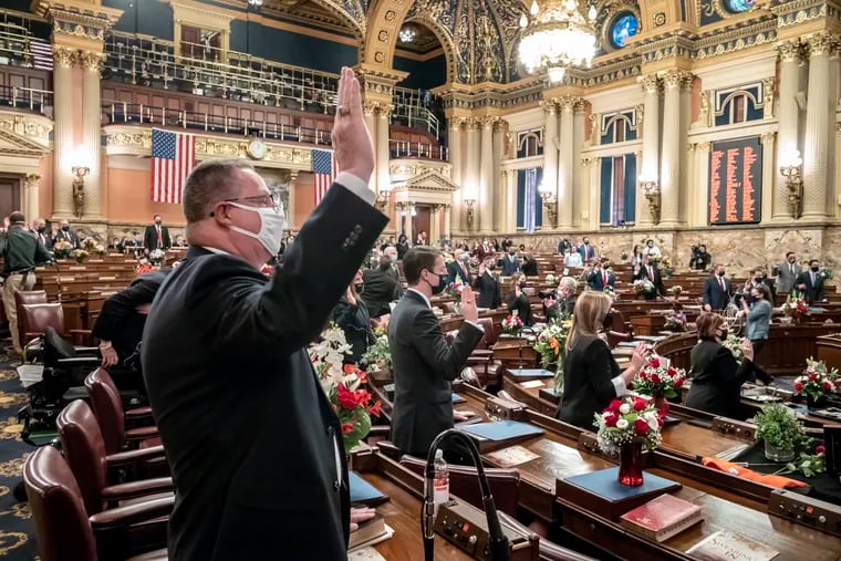 First-term legislators of the Pennsylvania House of Representatives are sworn in Tuesday, Jan. 5, 2021, at the state Capitol in Harrisburg, Pa. The ceremony marks the convening of the 2021-2022 legislative session of the General Assembly of Pennsylvania.