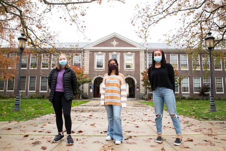 Juniors Jane Kinney, 16, Lily Cheatham, 16, and Jada Eible Hargro, 16, posed for a portrait outside of Haddonfield Memorial High school in Haddonfield, N.J. on Thursday, Nov. 12, 2020. Their junior class selected Black Lives Matter as their charity for spirit week.