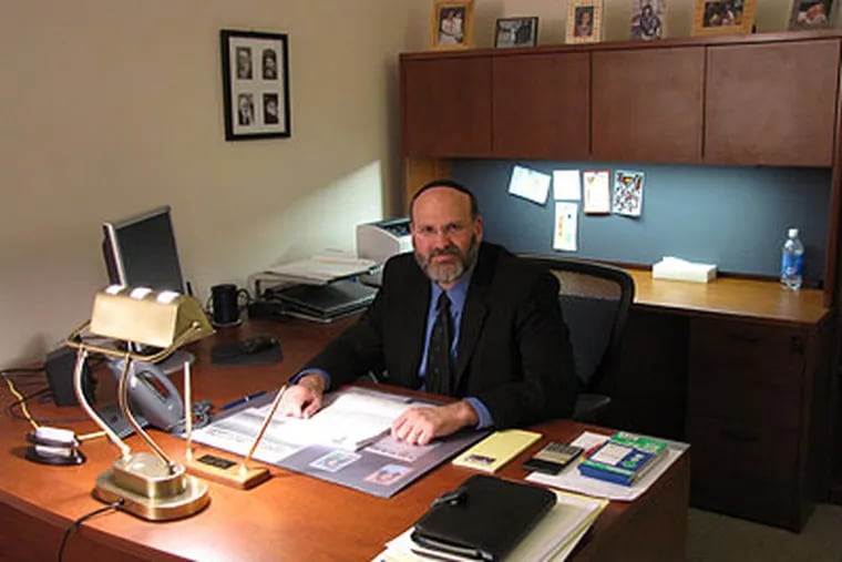 Douglas E. Gershuny, executive director of South Jersey Legal Services, Inc., at his desk in Camden, N.J. (Photo courtesy of South Jersey Legal Services)