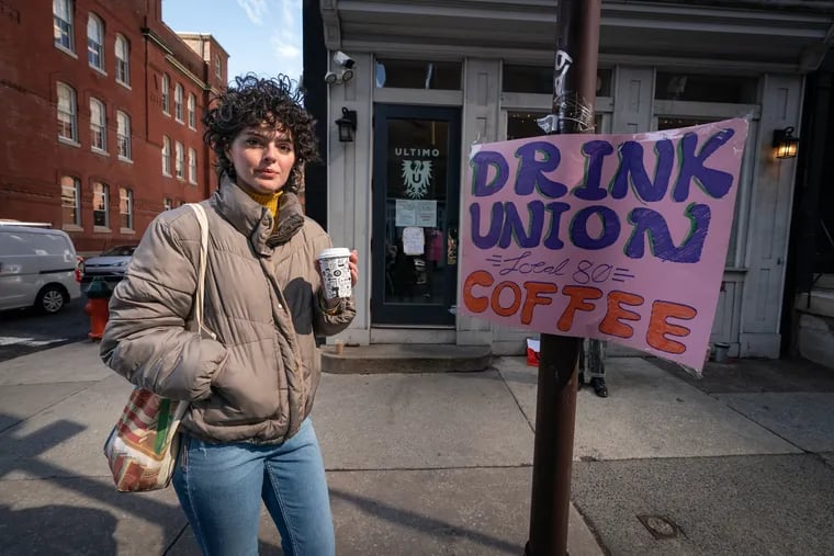 Kierstyn Cummando, who works at Ultimo Coffee, in front of Ultimo Coffee Rittenhouse, in Philadelphia, Thursday, Feb. 29, 2024. Workers at Ultimo Coffee went on a brief strike Thursday before reaching a tentative contract agreement with the owners.