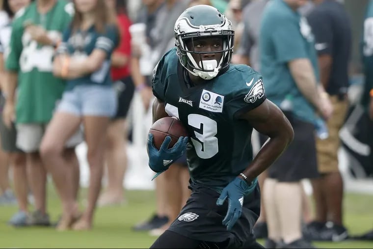 Eagles receiver Nelson Agholor heads up the field at training camp on Friday.