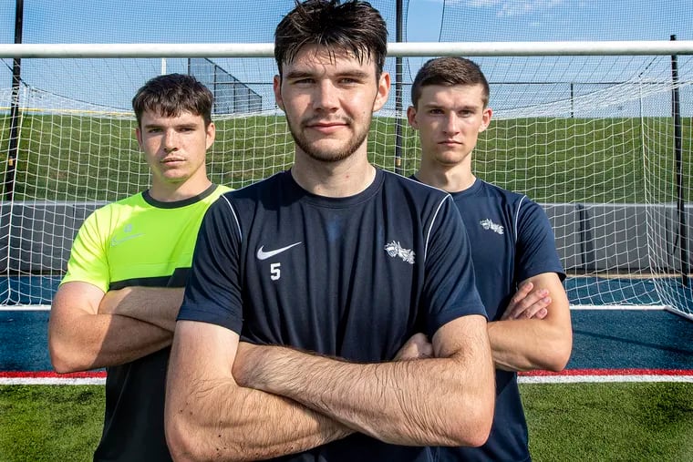 Drexel soccer players Michael McCarthy, center, Luke Smith, left, and Chris Donovan are all teammates again after winning two state titles at Conestoga High School in 2016 and 2017.