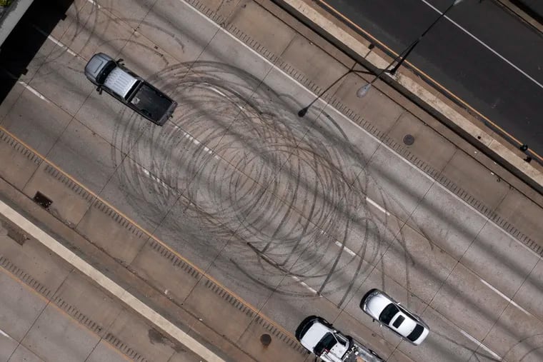 Tire marks shown on I-95 near Walnut Street in Philadelphia on Monday. A Pennsylvania State Police trooper shot and killed 18-year-old Anthony Allegrini Jr. on the highway early Sunday after responding to street racing.