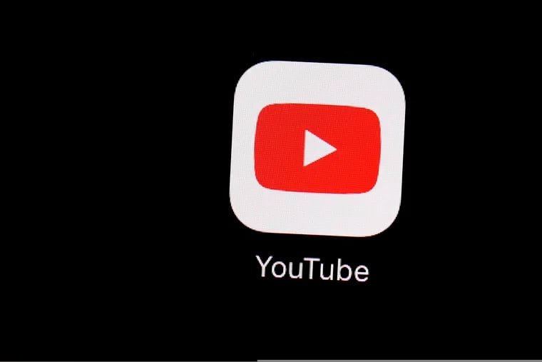 This March 20, 2018 file photo shows the YouTube app on an iPad in Baltimore. Campaigns have flooded YouTube with commercials in search of voters they may not be reaching on television. (AP Photo/Patrick Semansky, File)