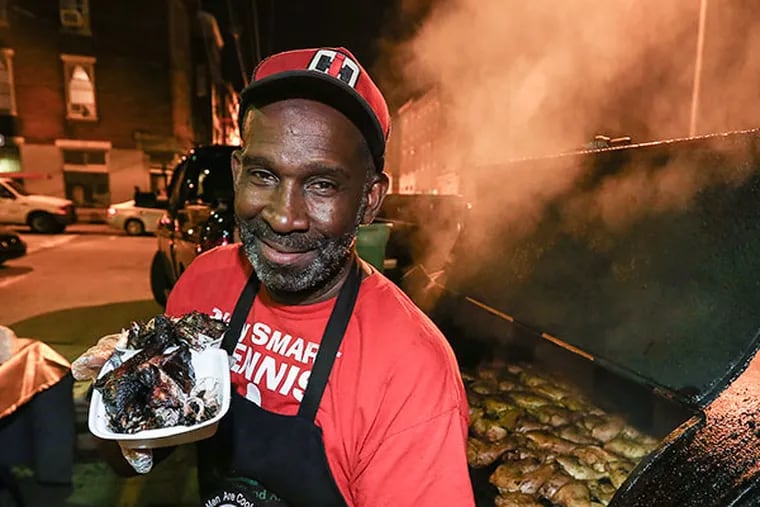 James Leggett and his "Side of the Road" jerk chicken stand, still standing at 2nd and Laurel streets. (  Steven M. Falk / Staff Photographer )