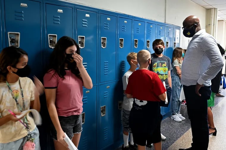Woodbury School Superintendent Andrew Bell talks with junior high school students as they tour the building during orientation at Woodbury High School in this file photo.