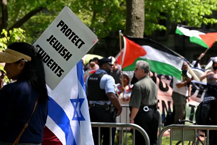 Pro-Israel (and pro-Palestine protesters chant at each other at the University of Pennsylvania Sunday.