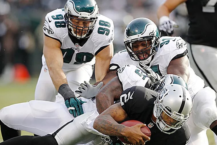 The Eagles' Connor Barwin, Fletcher Cox and Vinny Curry. (Ron Cortes/Staff Photographer)