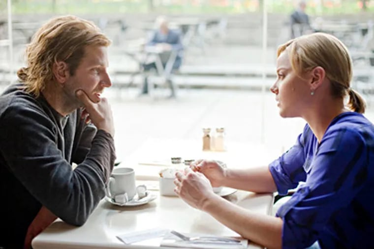 Bradley Cooper and Abbie Cornish in a scene from “Limitless.” He plays a
deadbeat New York writer who gets turbocharged; she is his girlfriend. (Relativity Media)
