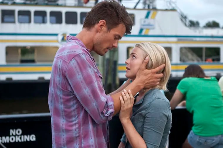 This film image released by Relativity Media shows Julianne Hough, right, and Josh Duhamel in a scene from "Safe Haven." (AP Photo/Relativity Media, James Bridges)