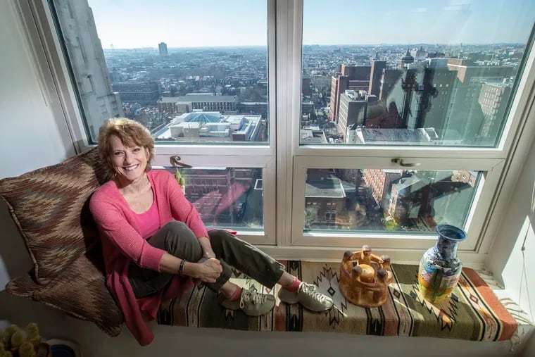 Diane Mastrull and her southern view from 17 stories up in her studio apartment.