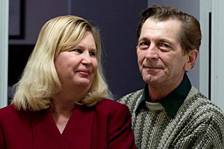 Doug and Pam Sterner at home in Va. He exposes phony medal winners. Both helped get the Stolen Valor Act enacted. (Carolyn Kaster / Associated Press)