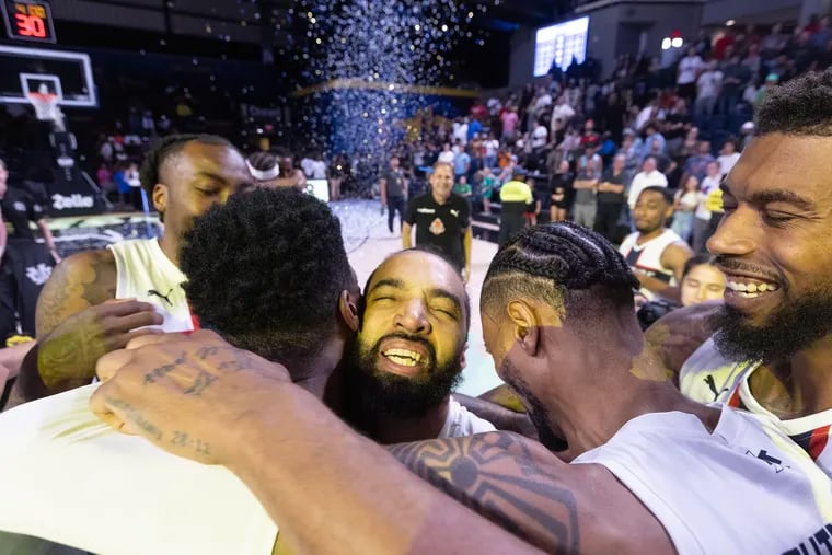The TBT championship returns to Philadelphia after 10 years to give out $1 million. Davin White (center) of Heartfire is swarmed by teammates after hitting the winning shot against Bleed Green on Aug. 3, 2023.