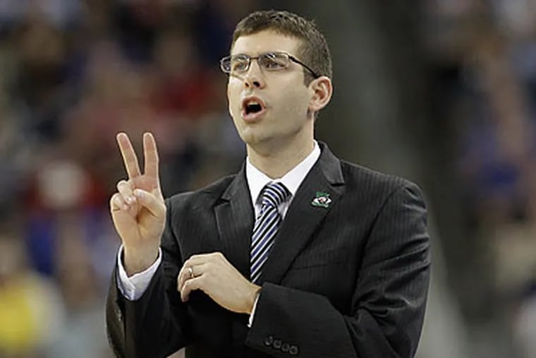 Brad Stevens will match wits with Phil Martelli and Dr. John Giannini when Butler joins the Atlantic 10. (Eric Gay/AP file photo)