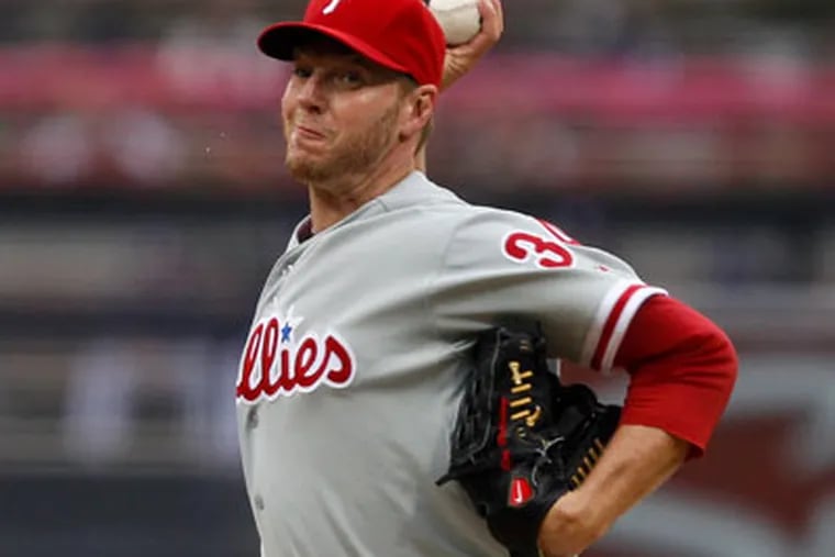 Philadelphia Phillies starting pitcher Roy Halladay works against the
San Diego Padres during first the inning of a baseball game Saturday,
April 21, 2012 in San Diego. (AP Photo/Lenny Ignelzi)