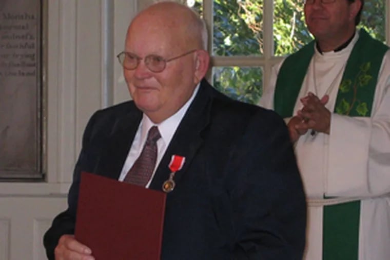 Sverre E. Larsen, who set aside a career in the performing arts for a life of service and volunteerism, accepted the St. Olaf Medal of Honor in September 2004.