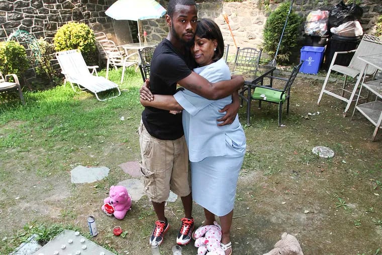 Aaron Rogers (left) with his foster mother, Patricia Thomas, in ’13. (STEVEN M. FALK / STAFF PHOTOGRAPHER)