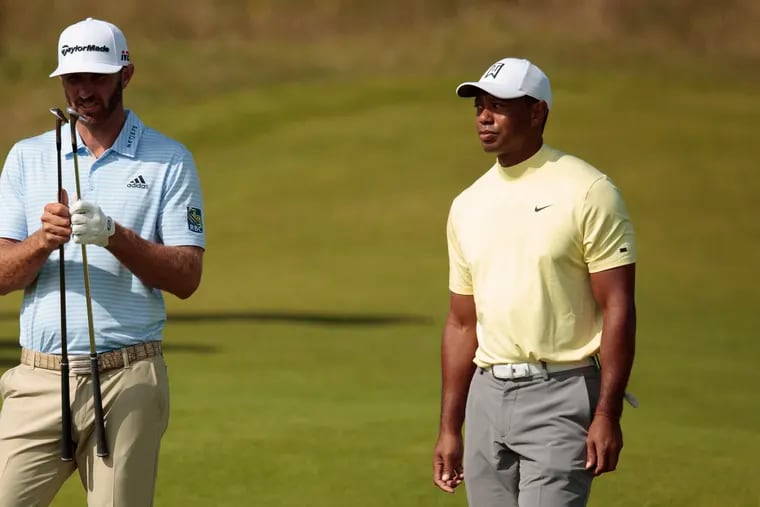 Tiger Woods (right) and Dustin Johnson played a practice round Monday at Royal Portrush Golf Club, Northern Ireland, site of the 148th Open Championship, which begins Thursday.