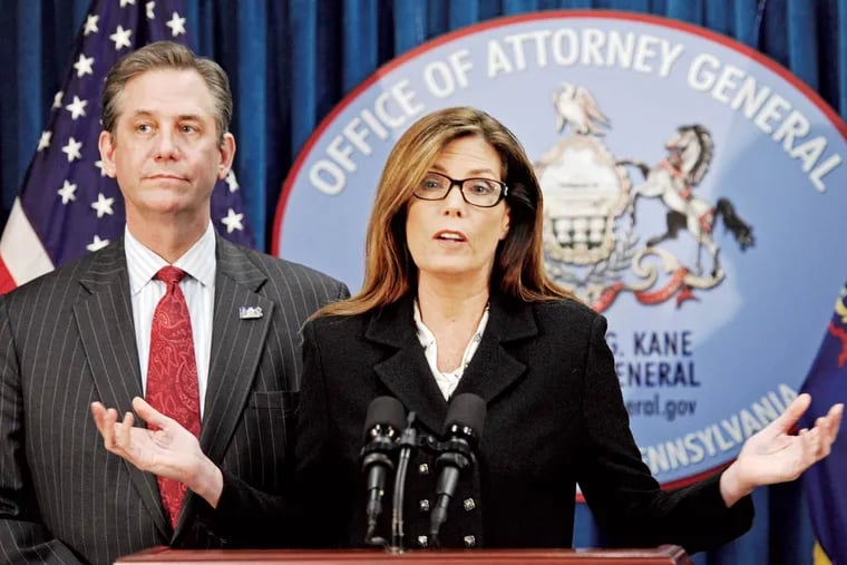 Attorney General Kathleen G. Kane, with First Deputy Attorney General Bruce L. Castor Jr., announces the pact.
